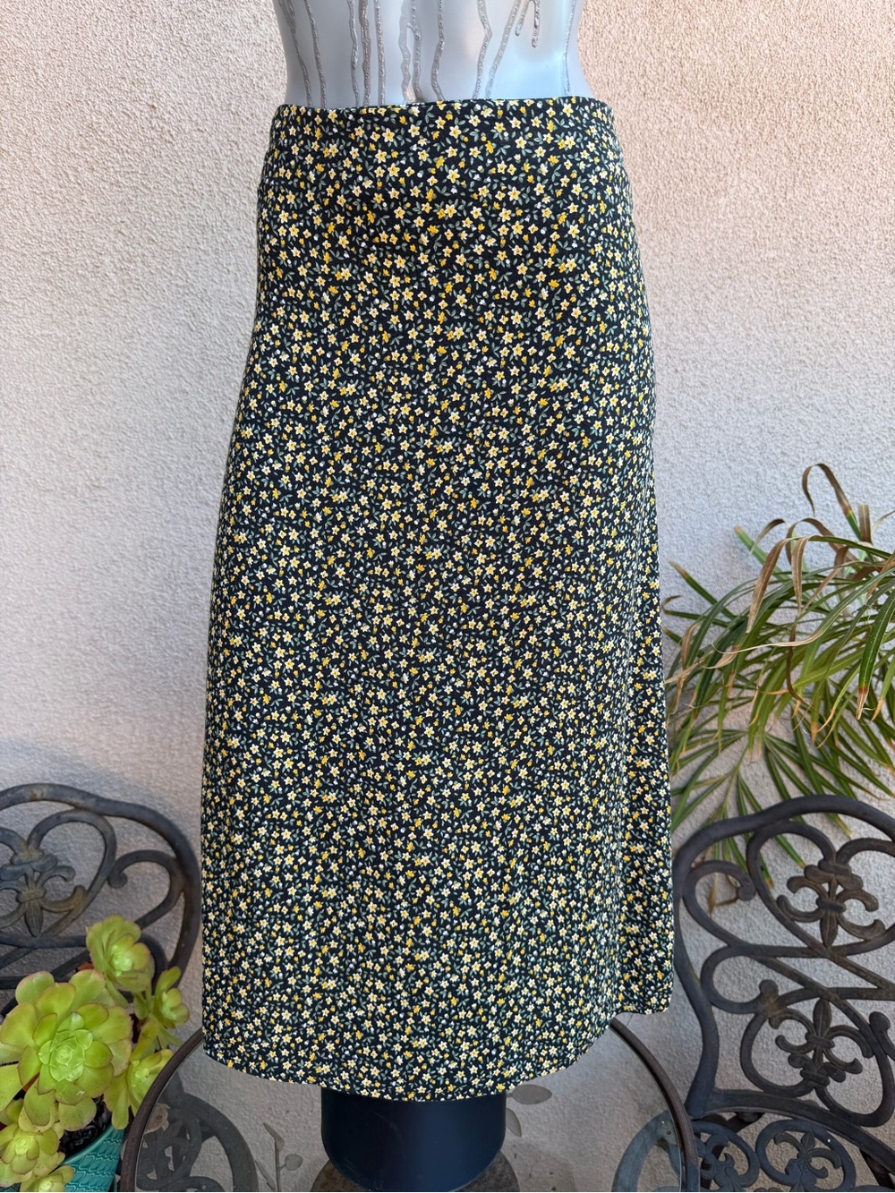 3/$36 Brandy Melville Black Midi Skirt with Yellow Floral Print.